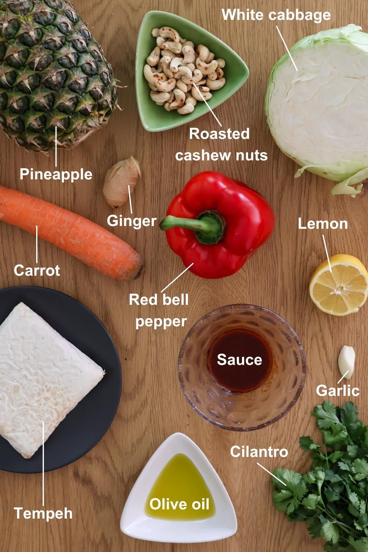 The ingredients for the recipe on a wooden table.