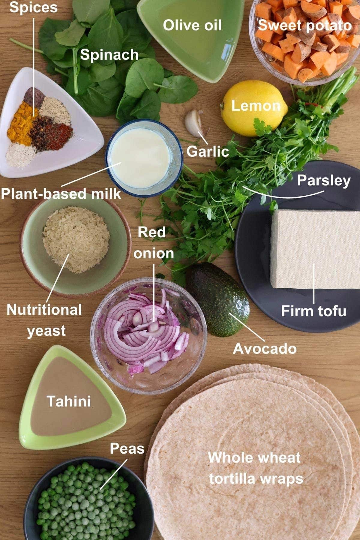 All the ingredients for the recipe in a wooden table.
