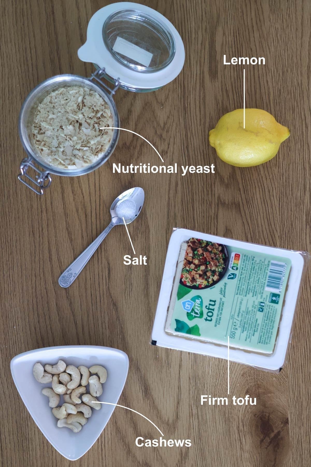 The ingredients for the recipe on a wooden table.