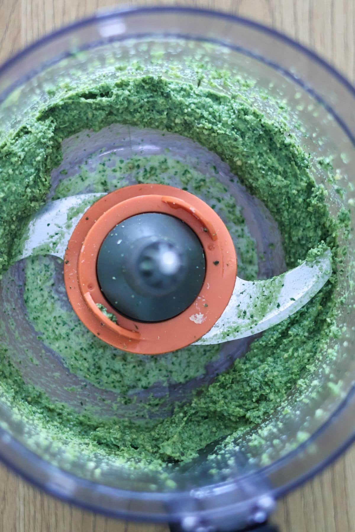 The vegan green pesto in a food processor.