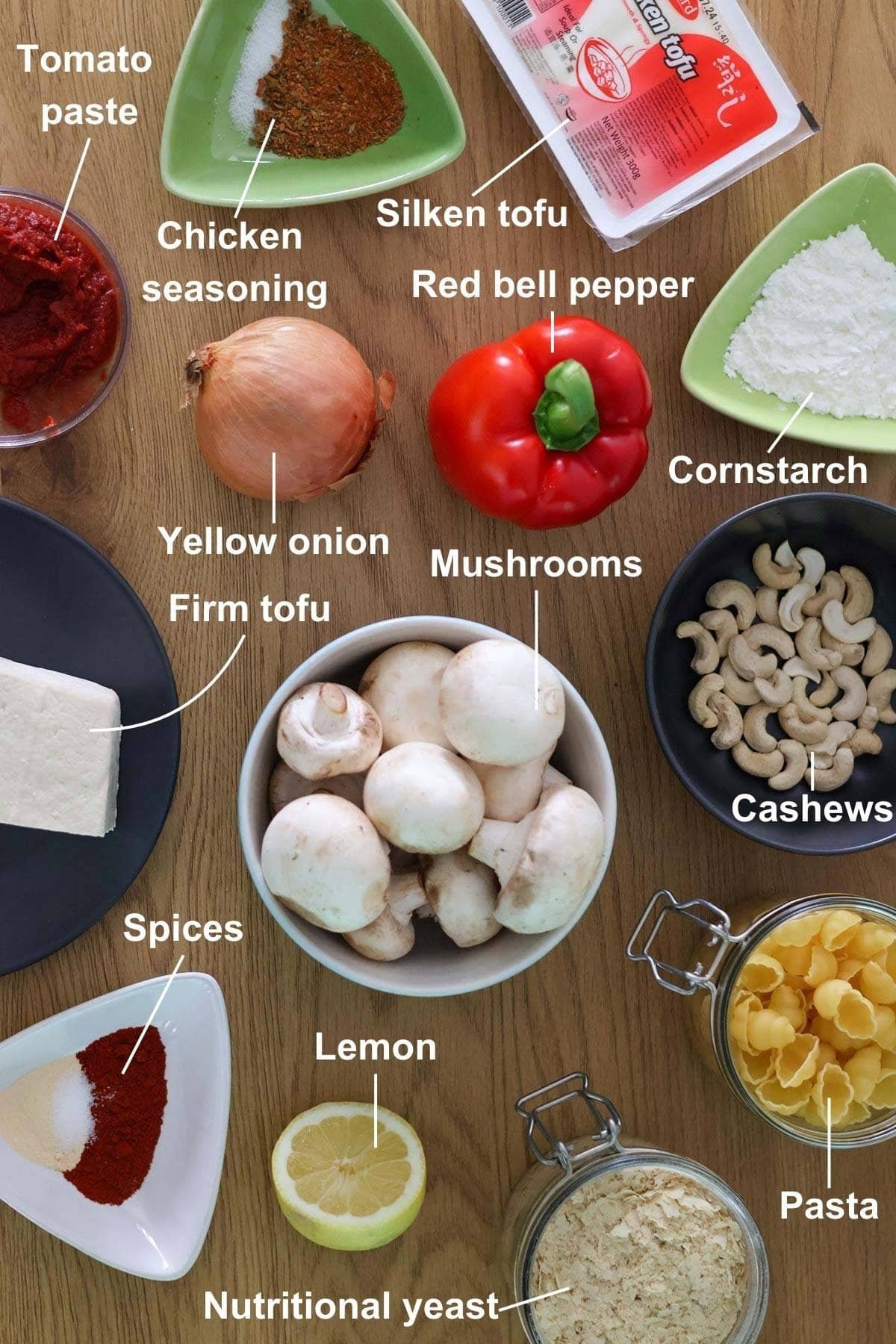 The ingredients for the Healthy Vegan Mushroom Stroganoff on a wooden table.