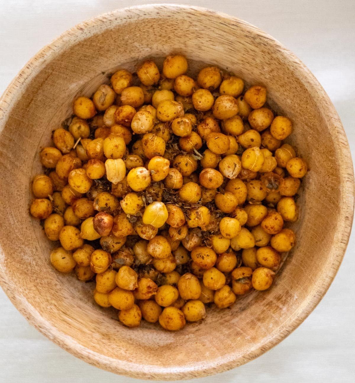 Crunchy chickpeas in a wooden bowl.